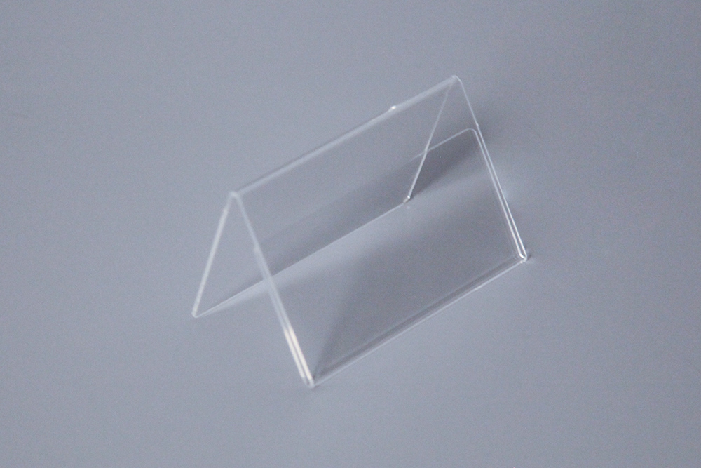 Display de mesa em acrílico com dobra